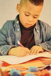 Young boy solving a problem