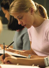 Girl writing in notebook