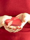 Woman holding heart