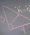 Math problem on chalkboard