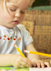 Young girl writing