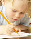 Little girl writing