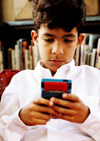 Boy using calculator