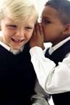 Boys whispering