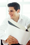 Boy smiling with book