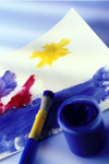 Paintbrushes with paint and painting