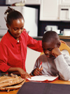 Two students working in a classroom