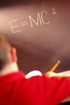 E=MC2 written on blackboard
