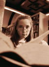 Girl with large book
