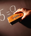 Math problem on chalkboard