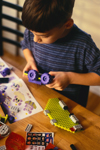 Boy playing with Legos