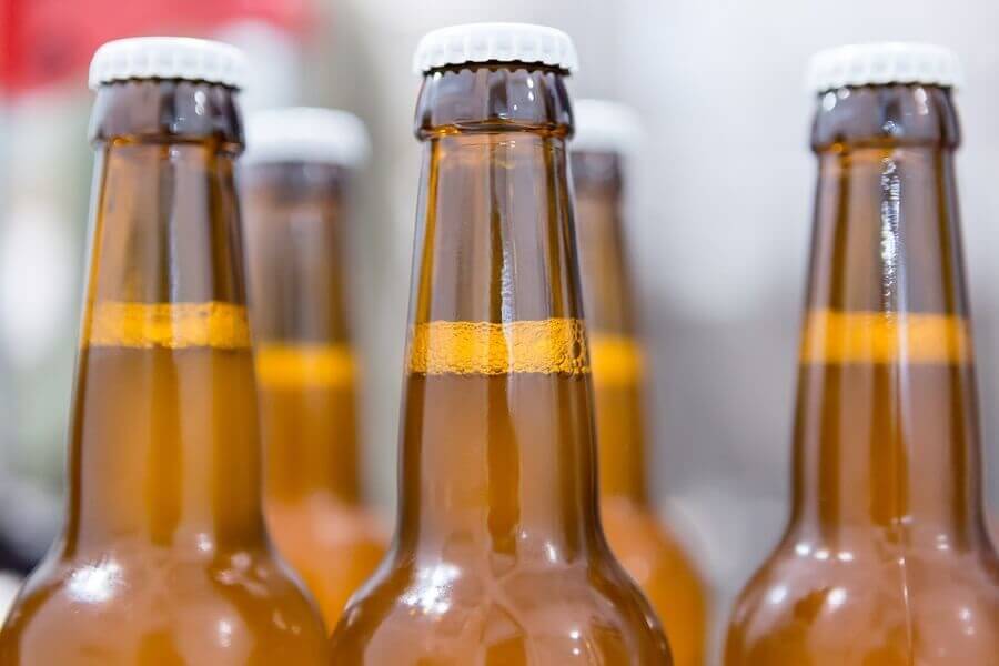 Close Up of Beer Bottles at Prom After Party