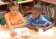 Boy and girl working on math problem