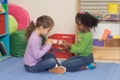 Two girls in a classroom