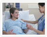 Pregnant woman in labor and delivery room at hospital