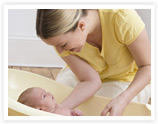Postpartum mother with newborn baby
