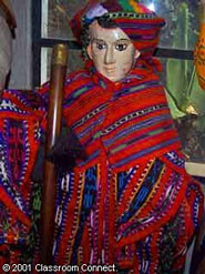 One of Don Juan's images of San Buenaventura is dressed in traditional Maya textiles. Don Juan is responsible for taking care of and dressing the saints that he is in charge of.