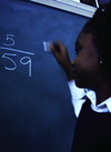 Girl solving math problem