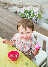 Boy Decorating Easter Eggs