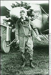 Charles Lindbergh poses in front of the 'Spirit of St. Louis'