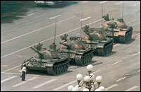 A Chinese Man Stands Alone to Block a Line of Tanks Heading East on Bejing's Cangan Blvd in Tiananmen Square on June 5, 1989